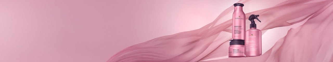 Pureology's Smooth Perfection, the Smooth Gloss system offers an enhanced formula, delivering superior frizz control and gloss for all color-treated hair types Pureology's Smooth Perfection, the Smooth Gloss system offers an enhanced formula, delivering superior frizz control and gloss for all color-treated hair types