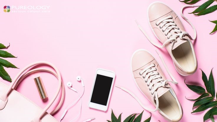trainers and iphone n a pink background